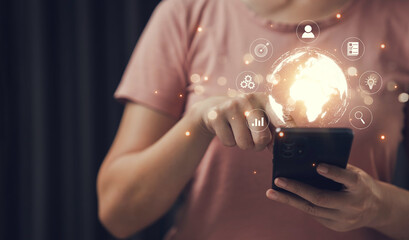 Business people use smart online transactions with internet network technology that has signals around the world, big data, information seekers around the world, check stock market prices