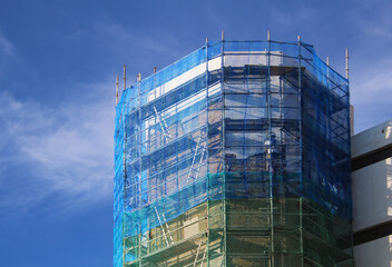 Construction site - scaffolding around apartment building (Tenerife, Spain)