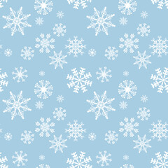 Winter seamless pattern with white snowflakes on a blue background