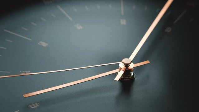 Golden hands of clock are moving slowly on a black face 