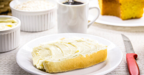 slice of salt bread cut with butter, called French bread in Brazil