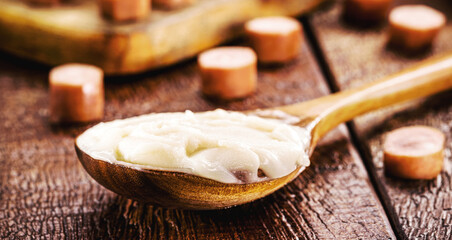 spoon with lard, pork fat used as a cooking ingredient in brazil