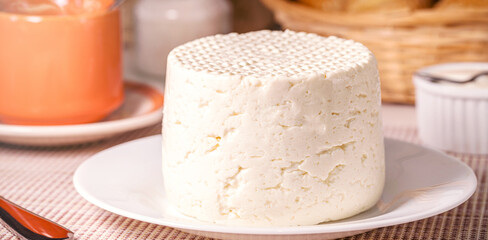homemade cheese made in Minas Gerais, State of Brazil, traditional organic Brazilian breakfast cheese, brazilian restaurant food