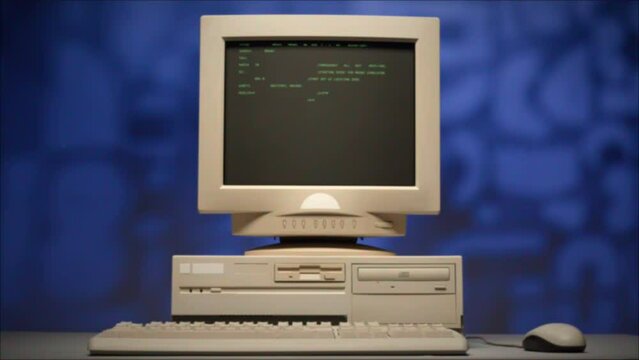 Retro pc with loading code console, programmer making scripts, green basic screen, Old computer studio blue night background close-up, Desktop vintage retro wave display, late 90s PC.