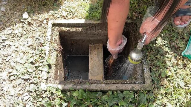 Cleaning inside the grease trap by scrub with a steel wire brush, some soap and water.
