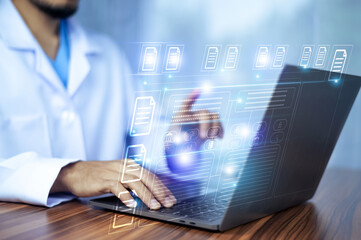 Doctor using software computer Document Management System (DMS), online documentation database...