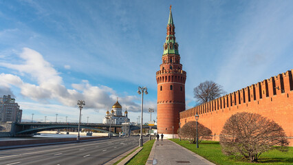 Obraz premium Vodovzvodnaya tower of the Moscow Kremlin with the Church of the Nativity in the background. Moscow, Russia. Architecture and sights of the Russian capital