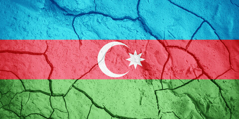 Flag of Azerbaijan. Azerbaijani symbol. Flag on the background of dry cracked earth. Azerbaijan flag with drought concept