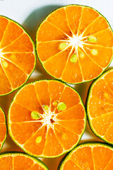 Macro orange,Heap of fresh orange slices background. Healthy nutrition with vitamin c. Close up view. 
