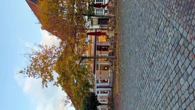 Typical German architecture fachwerkhauses in Bramsche, Osnabruck district, Lower Saxony, Germany, September 21, 2022 Vertical video. High quality 4k footage
