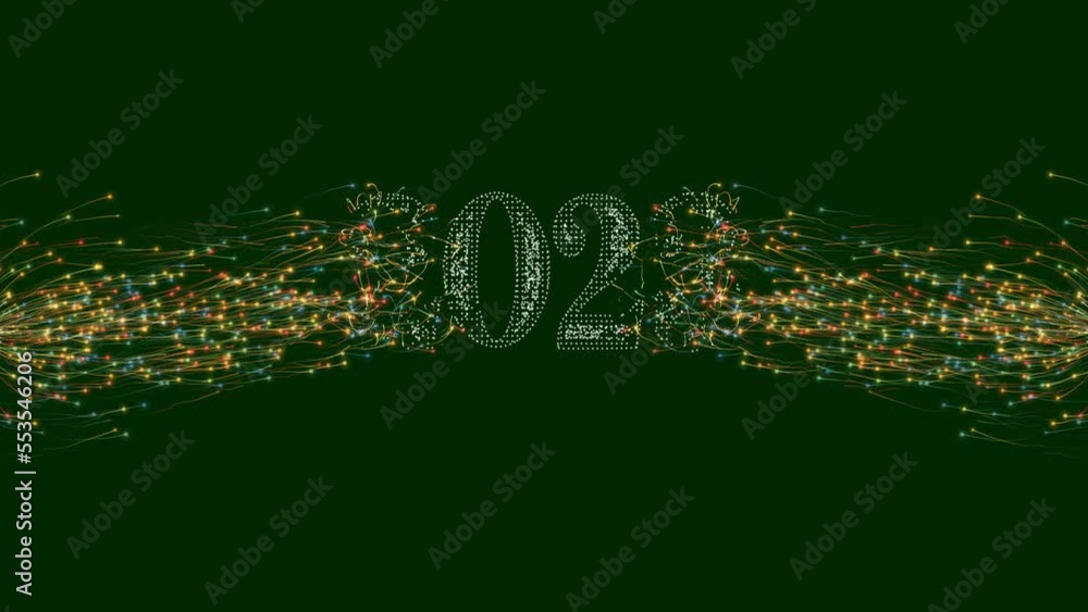 Aufkleber inscription 2023 dissolves in a festive multi-colored stream of particles on green background with a