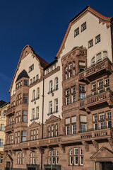 Beautiful traditional medieval buildings along the picturesque river Rhine promenade at sunset. DUSSELDORF, GERMANY.