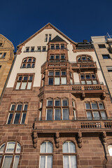 Beautiful traditional medieval buildings along the picturesque river Rhine promenade at sunset. DUSSELDORF, GERMANY.