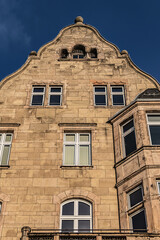 Beautiful traditional medieval buildings along the picturesque river Rhine promenade at sunset. DUSSELDORF, GERMANY.