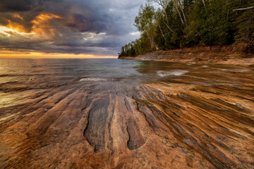 Lake Superior sunset at Miners Beach. Pictured Rocks National Shoreline
