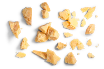 Fotobehang Hard mature cheese (Parmesan, Parmigiano), rough pieces top view isolated png © maxsol7