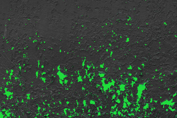 Black painted dark metal surface with old green verdant peeling paint pattern wall texture grunge design background