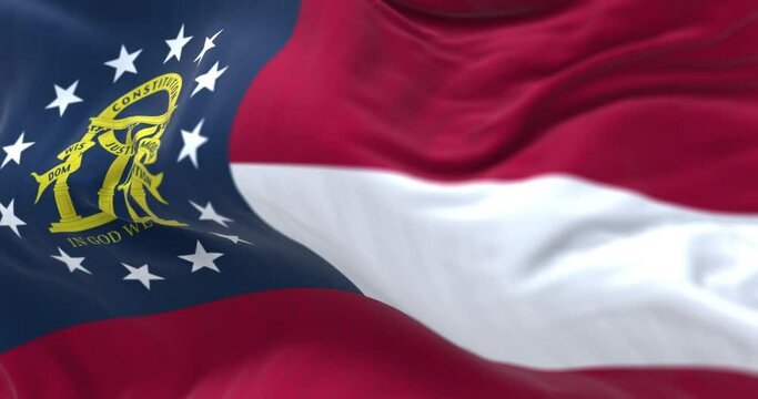 Close-up view of the Georgia state flag waving in the wind