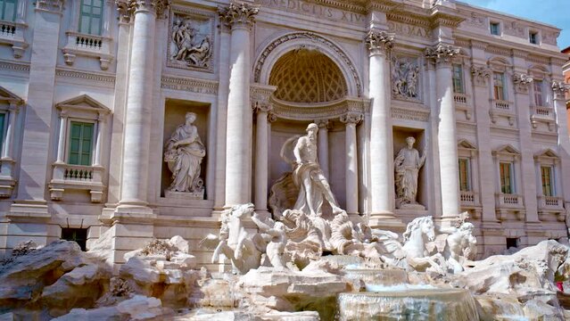 The Trevi Fountain it is the largest Baroque fountain in Rome and one of the most famous fountains in the world. RAW cinematic panning