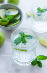 Iced cold lemonade with fresh lime and juice