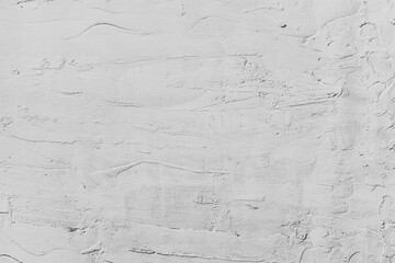 Light gray white plaster wall with abstract stucco pattern texture surface background