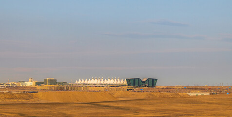 Distance view of Denver International Airport in Colorado - obrazy, fototapety, plakaty