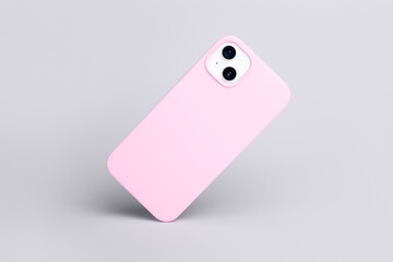 high quality silver iPhone 14 plus case mock up, Smart phone in pink silicone cover falls down back...