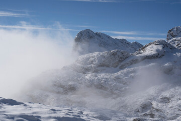Fototapeta na wymiar high mountains covered in snow in Picos de Europa National Park, Spain