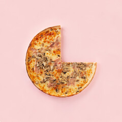 Abstract fast food concept with slice of pizza on isolated pastel pink background. Creative kitchen...