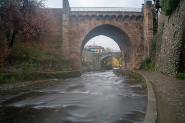 Fototapeta na wymiar view of a bridge over a river in the village of Potes in Cantabria, Spain