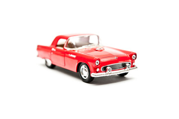 Obraz na płótnie Canvas red toy car model, isolated