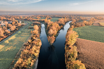 Rzeka Olza wpada do rzeki Odry, obie rzeki wyznaczają granicę Polski i Czech, widok z lotu ptaka jesienią - obrazy, fototapety, plakaty