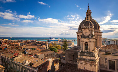 Fototapeta na wymiar Top view of St. Agata church and port of Catania from the Badia church