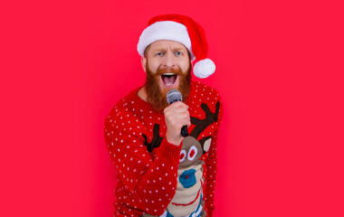 new year karaoke music. shouting man singing new year music in karaoke. new year santa man singing