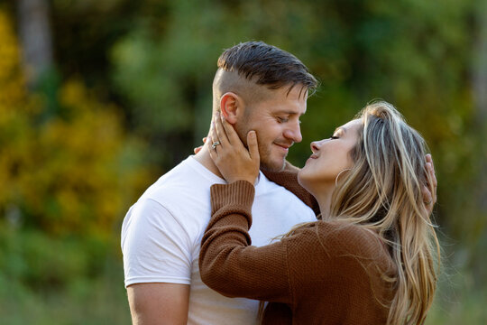 A husband and wife spending quality time together outoors in a city park; Edmonton, Alberta, Canada