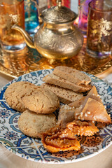 Traditional Moroccan tableware and sweets for tea ceremony