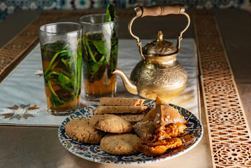 Traditional Moroccan tableware and sweets for tea ceremony