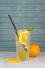 Italian soda with orange and lemon slice. concept: refreshing beverage