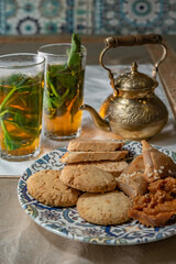 Traditional Moroccan tableware and sweets for tea ceremony