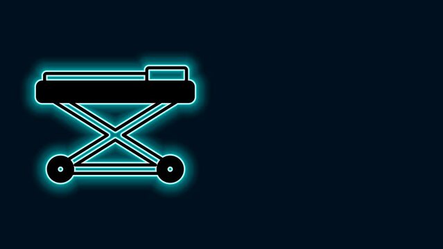 Glowing neon line Stretcher icon isolated on black background. Patient hospital medical stretcher. 4K Video motion graphic animation