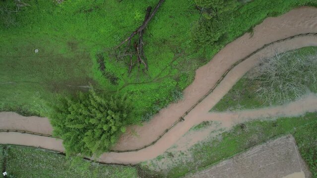 Aerial drone footage of flooding near Ribeira das Vinhas, Cascais, Portugal due to days of torrential rains in December 2022.