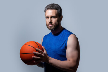 athlete man basketball player isolated on grey background. athlete man basketball player