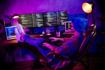 Photo of confident cool freelancer wear hat eyeglasses typing modern gadget keyboard indoors...