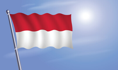 Monaco flag against a blue sky