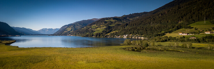 The panorama with Kitzsteinhorn(Tauern Alps) and Zell am See in the Zell am See-Kaprun region, Austrian Alps, Salcburgerland