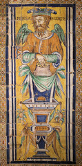 Fototapeta na wymiar Ceramic image of King Ferdinand II in the Cathedral of Sevilla