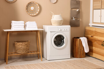 Stylish laundry room with modern washing machine. Interior design - obrazy, fototapety, plakaty