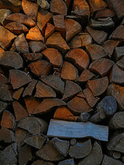 Pile of dry firewood as background, closeup