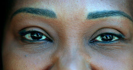 Black woman eyes closed, person opening eye macro close-up awakening