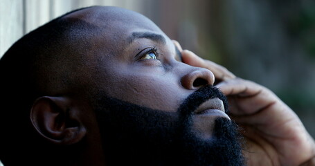 Contemplative black African man. Person meditating thoughts2